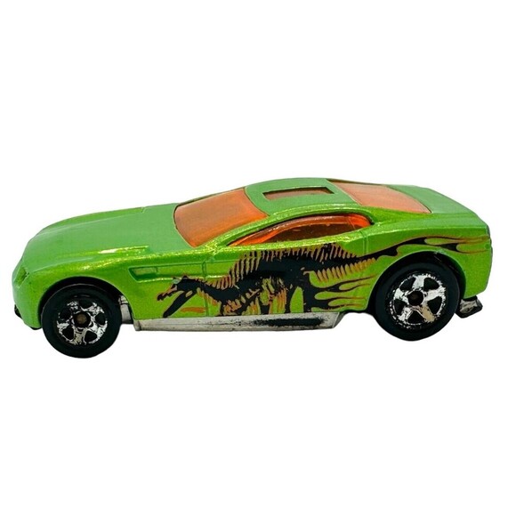 2004 Hot Wheels Torque Screw Green Diecast Toy Car with Black Dinosaur - Picture 1 of 6